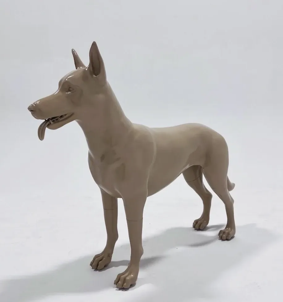 Full-scale Belgian Malinois statue finished in gloss tan