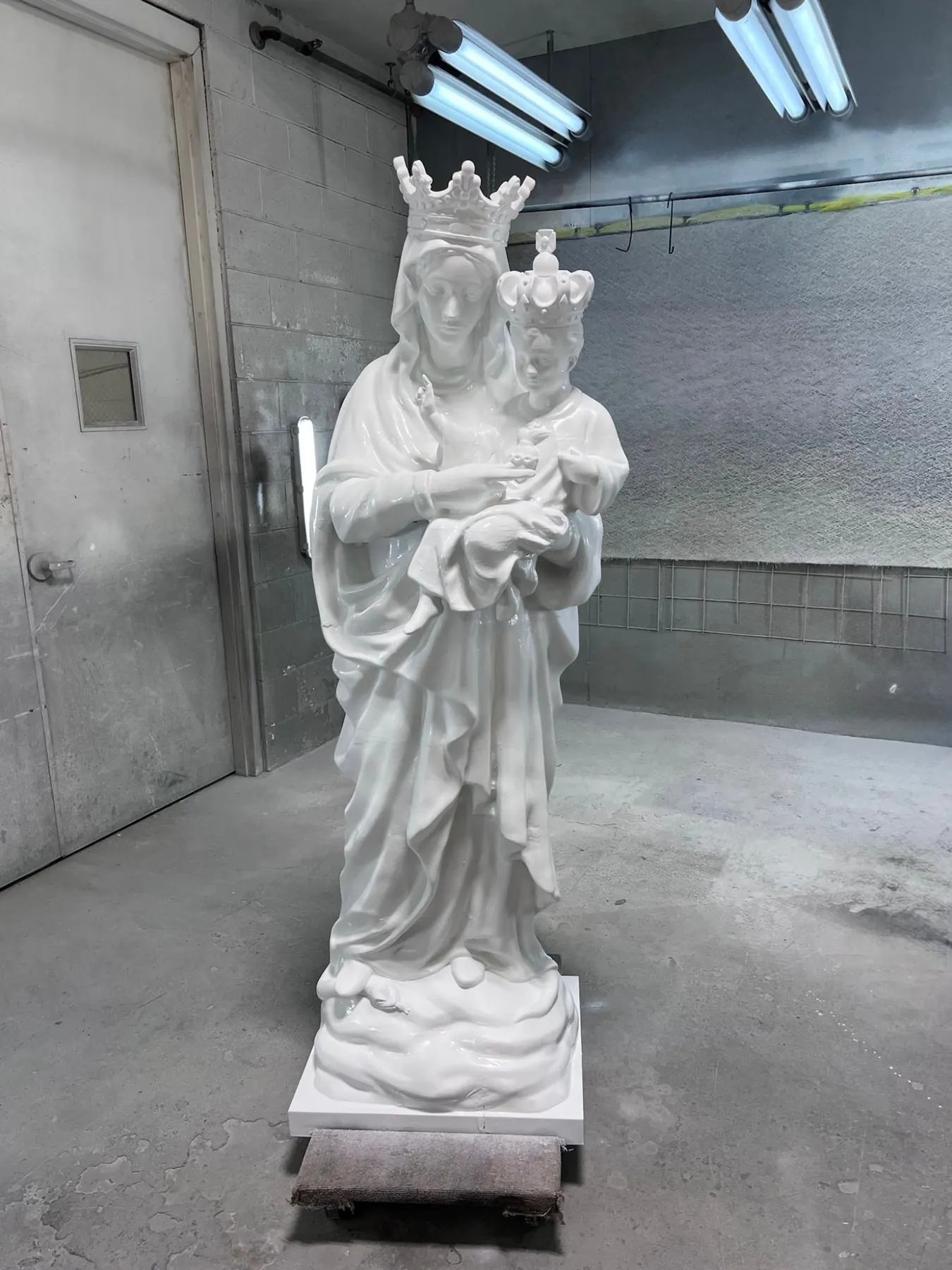Six-foot statue of a crowned Mary holding the crowned Christ Child, finished in gloss white